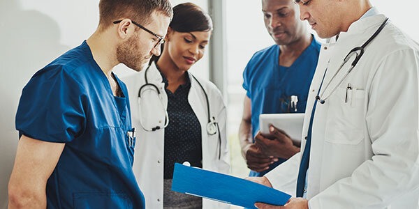 group-of-physicians-reading